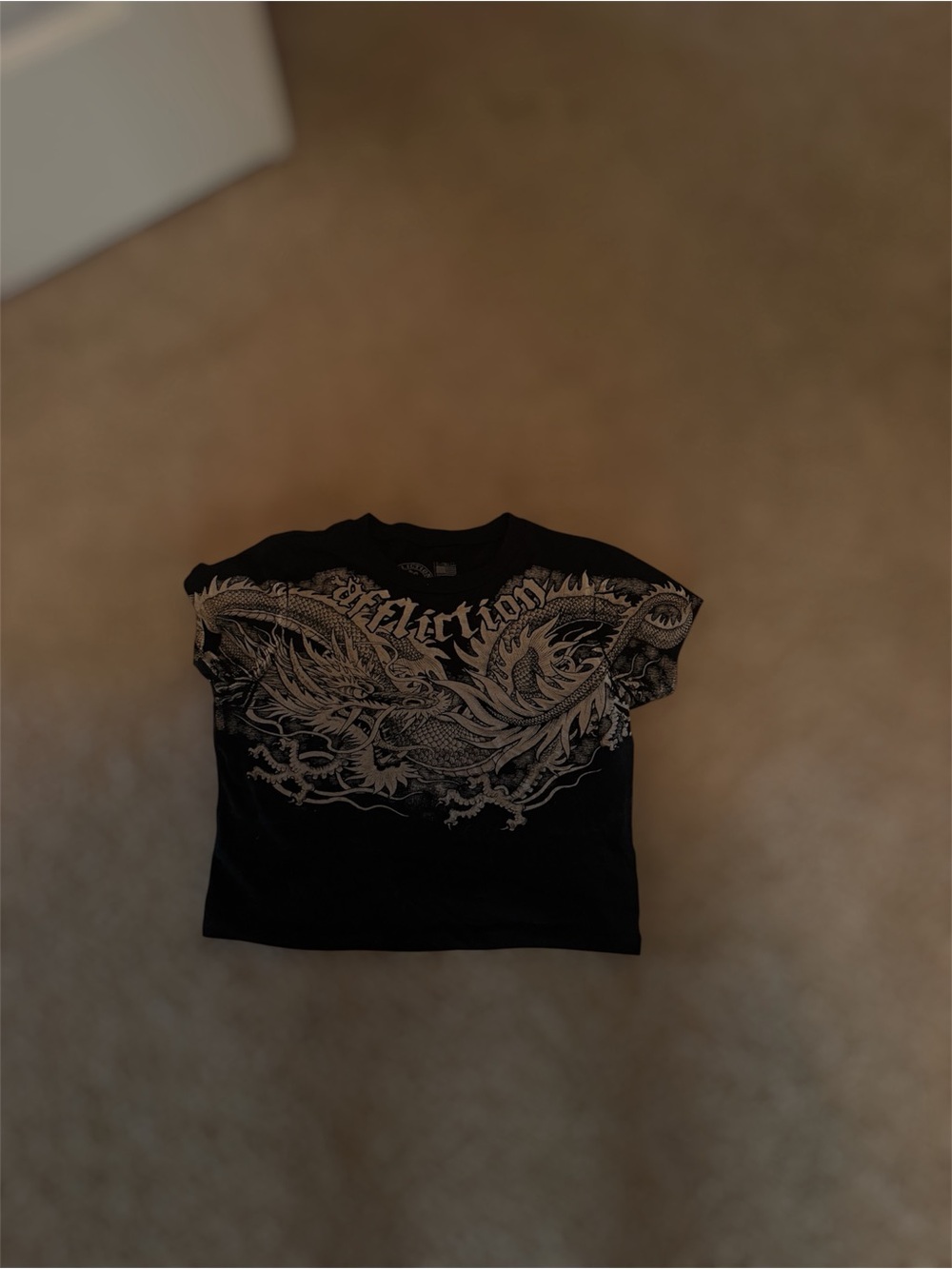 Black Graphic women’s Tee with Bold Silver Dragon Print